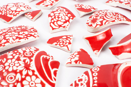 Broken red bowlの写真素材