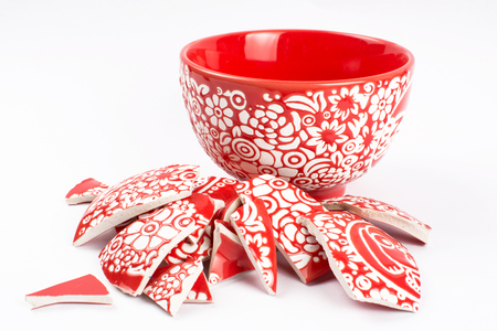 Broken red bowlの写真素材