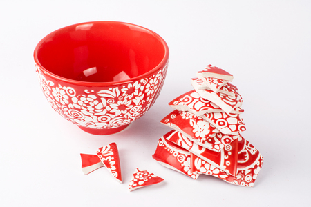 Broken red bowlの写真素材