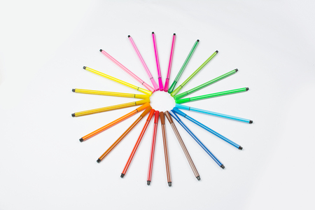 Colored brush pens at white backgroundの写真素材