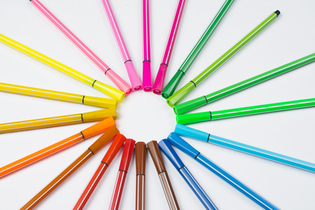 Colored brush pens at white backgroundの写真素材