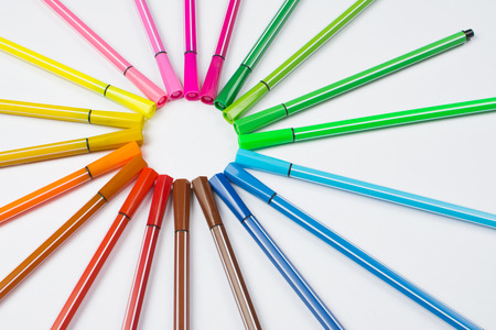 Colored brush pens at white backgroundの写真素材