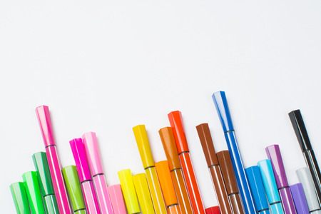 Colored brush pens at white backgroundの写真素材