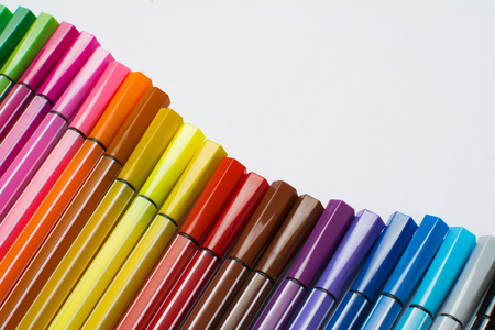 Colored brush pens at white backgroundの写真素材