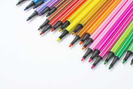Colored brush pens at white backgroundの写真素材