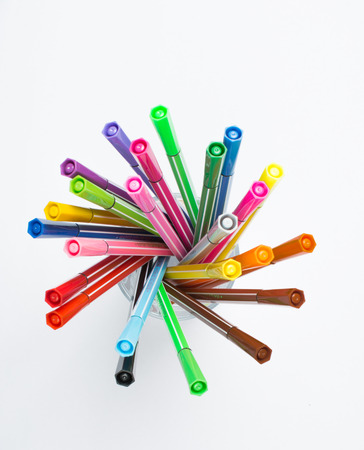 Colored brush pens at white backgroundのeditorial素材
