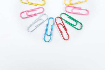 Colorful paper clips on white backgroundの写真素材