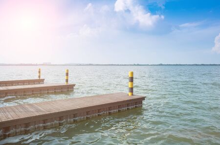 Small pier used by the lake to dock a cruise shipの写真素材