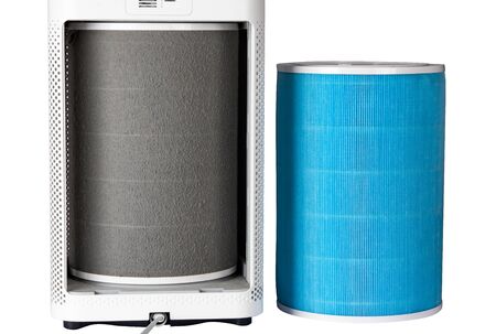 Comparison of new air purifier filters on white background with dusty filters after useの写真素材