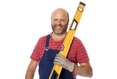 A portrait of a tradesman with tools of his trade.の写真素材
