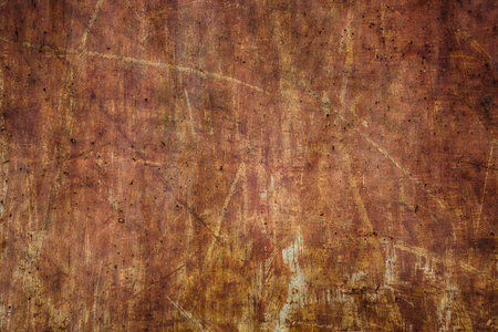 A cement surface stained to make a grungy background.