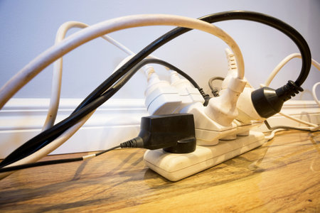 An electrical safety concept with too many things plugged into one circuit.