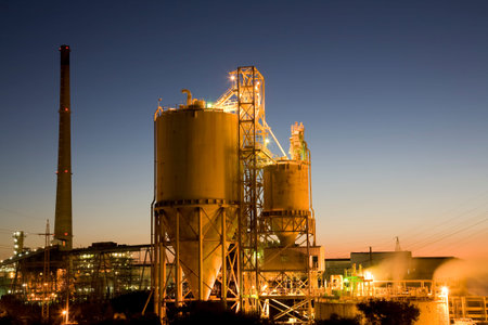 Indusrtrial storage silos in twilight.