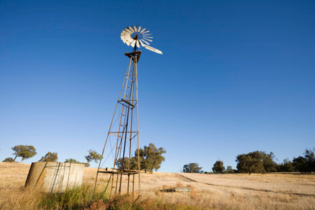 An iconic Aussie windmill and a water tank.の写真素材