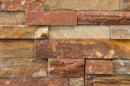 A stone block wall background.