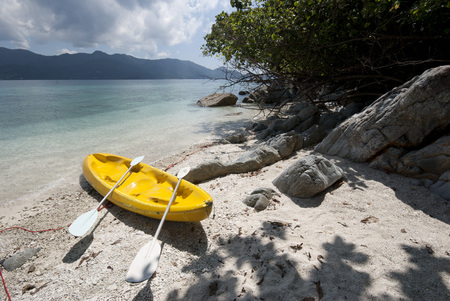 White sandy beach with a kayak on Koh Yuak, Trat, Thailandの写真素材