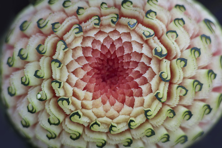 Thai fruit carving is a traditional Thai art that requires neatness, precision, meditation, and personal ability. Fruit carving persisted in Thailand as a respected art for centuries.の写真素材