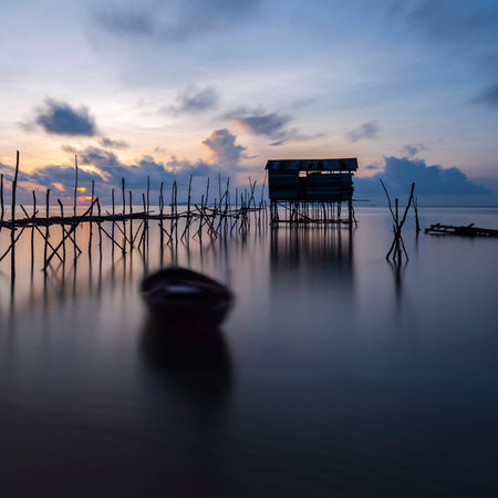 Morning view of Bintan Island Fishing Village, Indonesia. An offshore house built predominantly with wood.の写真素材
