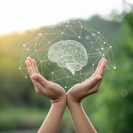 Human hands holding brain and network connection with nature bokeh backgroundの素材