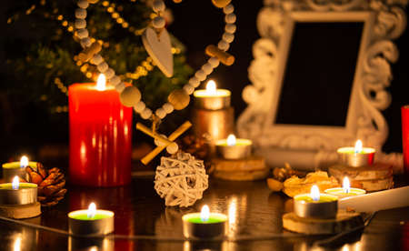 Pictures of candles and books for ritual, mysticism and mysteries about superstition. Concept Divine magic & occultismの写真素材