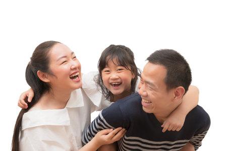 Happy Asian family woman and a man with little child smiling and fun in the white background.