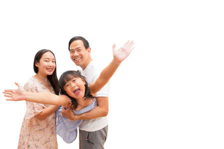 Happy Asian family woman and a man with little child smiling and fun in the white background.の写真素材