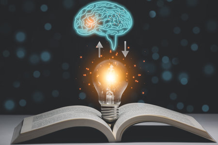 Hand held light bulb on the Book and light bulb style bokeh vintage dark background,Concept The idea...