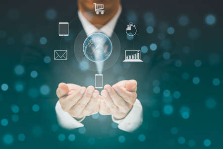 Businessman Touching in graph Screen Icon of a media screen, Technology Process System Business concept.の写真素材