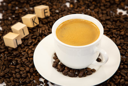 Breakfast Served in the morning with Black coffee hot and Beans close-up on Wooden Table,の写真素材