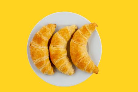 Croissant bread of bake Breakfast in the morning for health or diet food in Wooden tray on the white...