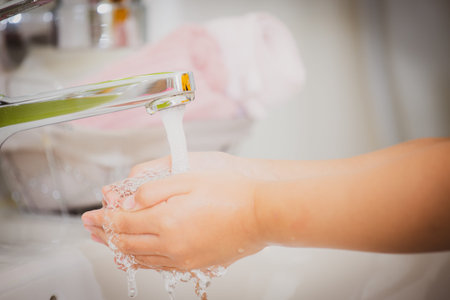 washing hands in a hospital or home with liquid soap mixed with antiseptics. prevent Viruses covid19...