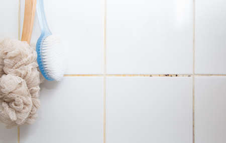 Mold or fungus of the wall in the Shower room causing black or brown mold in the bathroom or toilet room caused by the hot water and accumulation of bacteria.の写真素材