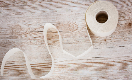 A large white toilet paper roll for use in bathrooms or kitchens, used for cleaning dirt in the...