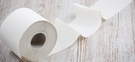 A large white toilet paper roll for use in bathrooms or kitchens, used for cleaning dirt in the...