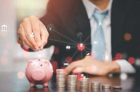 Businessman touch coins with line icon and Coins stack on the wooden table , Saving ideas and investment budget, Creative ideas concept of saving money  concept, Copy spaceの写真素材
