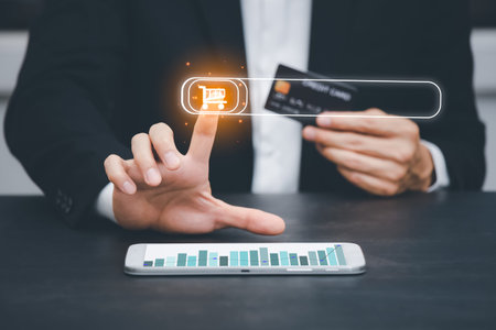Businessman holds the tablet and light bulb in graph Screen Icon of a media screen, Technology...