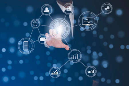 Businessman touchscreen on the graph Screen Icon of a media screen, Technology Process System Business with Communication and marketing concept.の写真素材