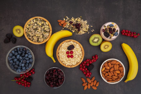 Fruit and Bread Whole grains and nuts, yogurt mix with Cherry , banana, avocado in the wooden table....