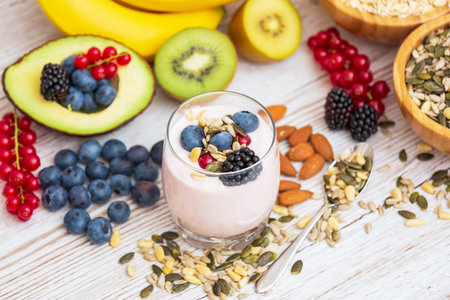 Fruits and Breakfast with Whole grains and nuts, yogurt mix with Cherry , banana, avocado in the...