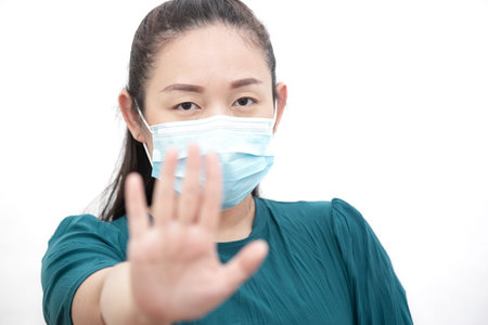 The image face of a young Asian woman and family wearing mask to prevent germs, toxic fumes, and...