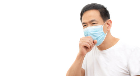 The image face  of a young Asian man wearing a mask to prevent germs, toxic fumes, and dust....