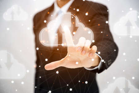 Business man touching connect to data information on the cloud icon computing network., Backup Storage Data Internet, networking and digital, Share global, and technology, concept.の写真素材