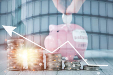 Double exposure of coins on the white background for finance and banking and Money spending planning, and investment budget, Business saving money concept, Copy spaceの写真素材