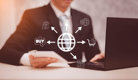 Businessman is hands are using a computer notebook to Searching for information and website, working indoors using laptop computer, Data Search Technology Search Engine Optimization concept.の写真素材