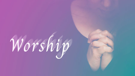 Woman's hand praying and The word Worship and worship to GOD Using hands to pray in religious...