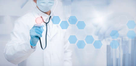 Health care and medical services concept, Doctor medicine with stethoscope in a hospital touching icon network connection with modern virtual screen interface, medical technology network concept.の写真素材