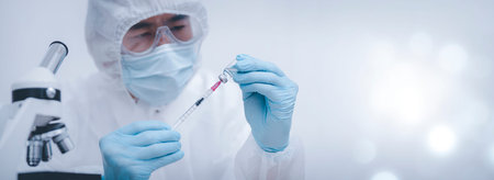 Doctor or scientist with a stethoscope holding  vaccine, measles, vaccine shot for diseases outbreak...
