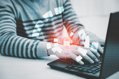 Hand Hacker touch laptop or smartphone and Touching in graph Screen code of a media screen on the...