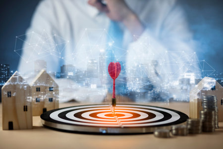 Targeting the business concept, Businessman touch red arrow dart to the virtual target dartboard, Executive marketing, investment goal and target for business investment concept, mini home.の写真素材