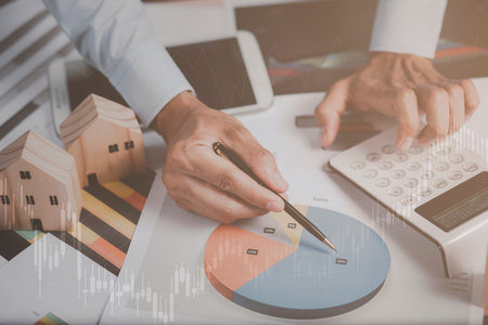Concept financial transactions online, businessman  holding pen and point at financial analyzing...